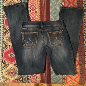 Size 28. Retro style Wrangler boot cut jeans